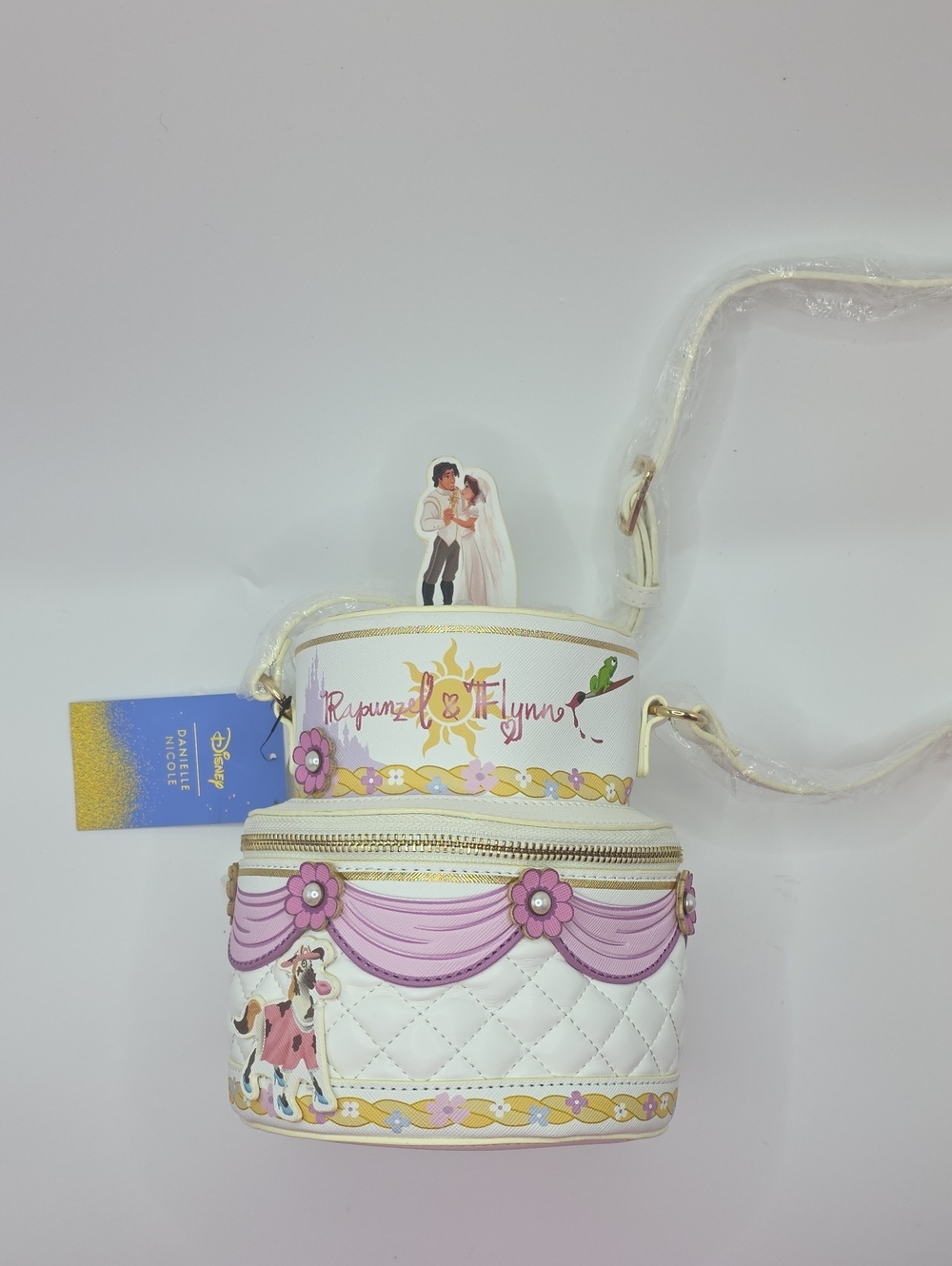 Danielle Nicole White and Pink Rapunzel & Flynn Crossbody Bag